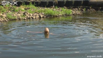 Seductive Blonde Smokes And Gets Drenched In Lake Screencap 47 on www.sinx.com