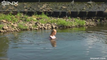 Seductive Blonde Smokes And Gets Drenched In Lake Screencap 48 on www.sinx.com
