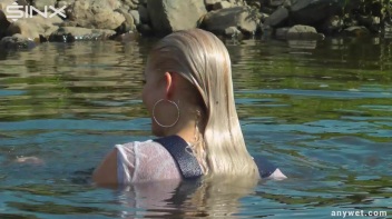 Seductive Blonde Smokes And Gets Drenched In Lake Screencap 49 on www.sinx.com
