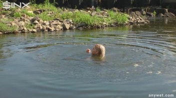 Seductive Blonde Smokes And Gets Drenched In Lake Screencap 60 on www.sinx.com