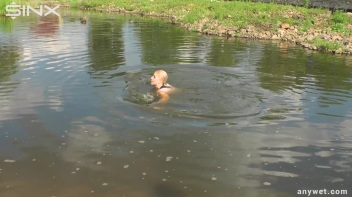 Seductive Blonde Smokes And Gets Drenched In Lake Screencap 61 on www.sinx.com