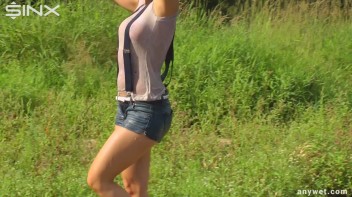 Seductive Blonde Smokes And Gets Drenched In Lake Screencap 66 on www.sinx.com