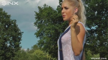 Seductive Blonde Smokes And Gets Drenched In Lake Screencap 7 on www.sinx.com