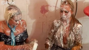 Wet and Messy Blondes Get Doused In Paint Screencap 34 on www.sinx.com