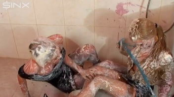 Wet and Messy Blondes Get Doused In Paint Screencap 49 on www.sinx.com