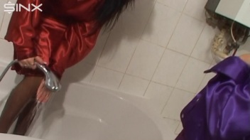 Slippery Clothed Bathtub Fun For Lesbians Screencap 11 on www.sinx.com