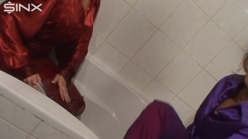 Slippery Clothed Bathtub Fun For Lesbians Screencap 19 on www.sinx.com