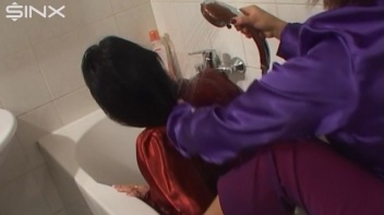 Slippery Clothed Bathtub Fun For Lesbians Screencap 23 on www.sinx.com