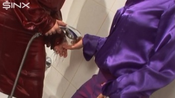 Slippery Clothed Bathtub Fun For Lesbians Screencap 36 on www.sinx.com