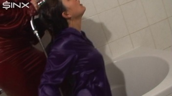 Slippery Clothed Bathtub Fun For Lesbians Screencap 46 on www.sinx.com