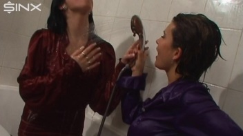 Slippery Clothed Bathtub Fun For Lesbians Screencap 51 on www.sinx.com