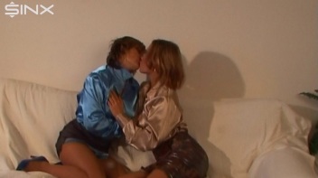 Kinky Lesbians Kiss And Tease On Sofa Screencap 9 on www.sinx.com