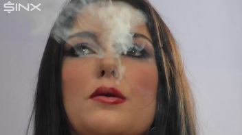 Dark Haired Teen Smokes In Red Lipstick Screencap 31 on www.sinx.com