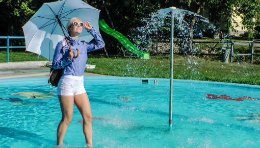 Latest deal - Playful Blonde Gets Drenched Under Water Fountain