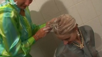 Fully Dressed Ladies Wash Their Hair Together Screencap 12 on www.sinx.com