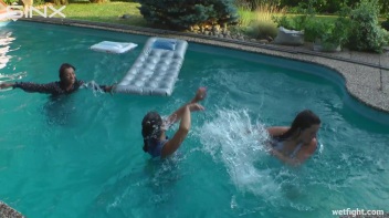 Three wild girls in pool cat fight Screencap 45 on www.sinx.com