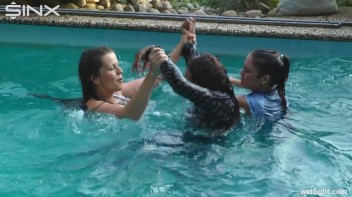 Three wild girls in pool cat fight Screencap 48 on www.sinx.com