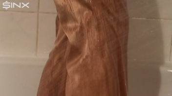 European Minx Showers In Clothes Screencap 4 on www.sinx.com