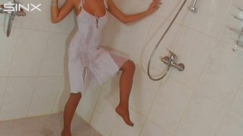 Brunette In White Dress Seductively Showers Screencap 4 on www.sinx.com