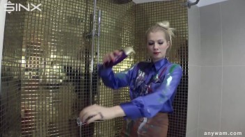 Fully Dressed Blonde Washes Off In The Shower Screencap 2 on www.sinx.com