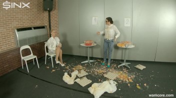 Playful businesswomen cover each other in raw egg Screencap 1 on www.sinx.com