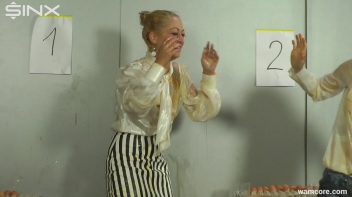 Playful businesswomen cover each other in raw egg Screencap 16 on www.sinx.com