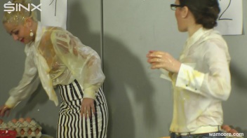 Playful businesswomen cover each other in raw egg Screencap 21 on www.sinx.com
