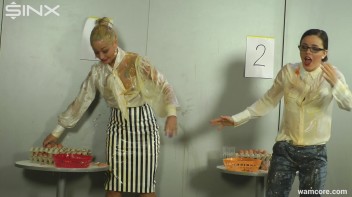 Playful businesswomen cover each other in raw egg Screencap 22 on www.sinx.com