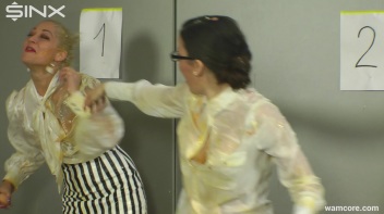Playful businesswomen cover each other in raw egg Screencap 23 on www.sinx.com