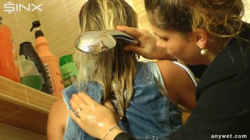 Two fully-clothed girls get wet in the shower Screencap 30 on www.sinx.com