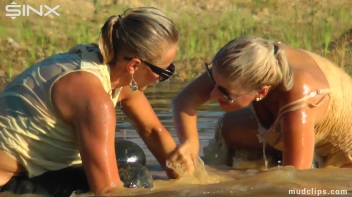 Mud Wrestling Catfighting Babes Dirty Dunking - Cam 2 Screencap 32 on www.sinx.com