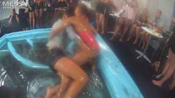Messy Wrestling: Swimsuit vs. Short Shorts -  Shiny, Oily Smackdown! Screencap 13 on www.sinx.com