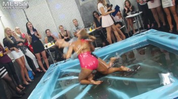 Messy Wrestling: Swimsuit vs. Short Shorts -  Shiny, Oily Smackdown! Screencap 15 on www.sinx.com