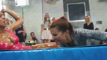 Messy Wrestling: Swimsuit vs. Short Shorts -  Shiny, Oily Smackdown! Screencap 22 on www.sinx.com