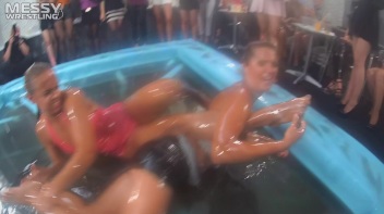 Messy Wrestling: Swimsuit vs. Short Shorts -  Shiny, Oily Smackdown! Screencap 36 on www.sinx.com