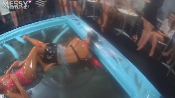 Messy Wrestling: Swimsuit vs. Short Shorts -  Shiny, Oily Smackdown! Screencap 37 on www.sinx.com
