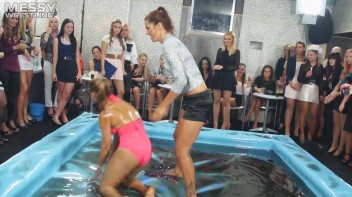 Messy Wrestling: Swimsuit vs. Short Shorts -  Shiny, Oily Smackdown! Screencap 8 on www.sinx.com