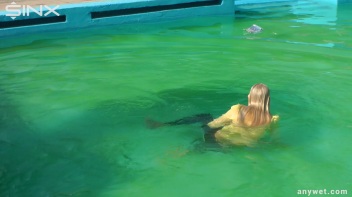 Sexy Blonde Swims And Splashes In Outdoor Pool Screencap 39 on www.sinx.com