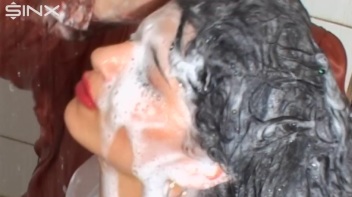 Raven Haired Babes Lather Up Their Hair Screencap 55 on www.sinx.com