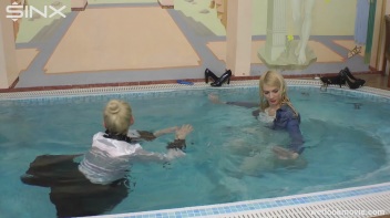 Clothed Lesbian Friends Jump Into Pool Together Screencap 44 on www.sinx.com