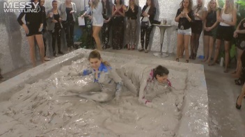 Muddy Wrestling: Satin, Skirts, and Audience Mud Blasted To The Max!  Everyone Gets A Taste! Screencap 11 on www.sinx.com