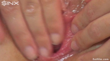 Self Fisting Gives Brunette Babe Immense Pleasure Screencap 45 on www.sinx.com