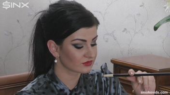 Seductress Smokes And Seduces Screencap 19 on www.sinx.com