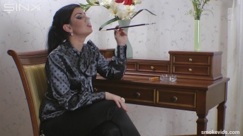 Seductress Smokes And Seduces Screencap 23 on www.sinx.com