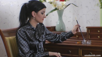 Seductress Smokes And Seduces Screencap 32 on www.sinx.com