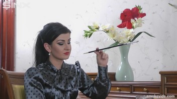 Seductress Smokes And Seduces Screencap 7 on www.sinx.com