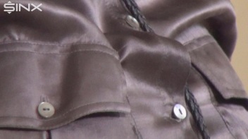 Ballgagged Brunette Drools Over Her Designer Clothes Screencap 2 on www.sinx.com