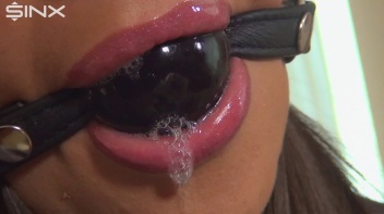 Ballgagged Brunette Drools Over Her Designer Clothes Screencap 35 on www.sinx.com