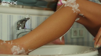 Stunning European Shaves Her Legs In The Sink Screencap 36 on www.sinx.com
