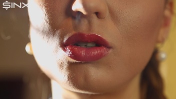 Beautiful Brunette Smiles While Enjoying A Cigarette Screencap 14 on www.sinx.com
